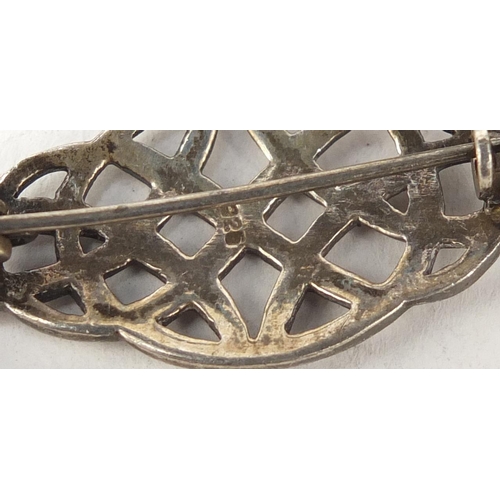 2403 - Victorian and later silver and white metal brooches, the largest 8cm in length, total 124.0g