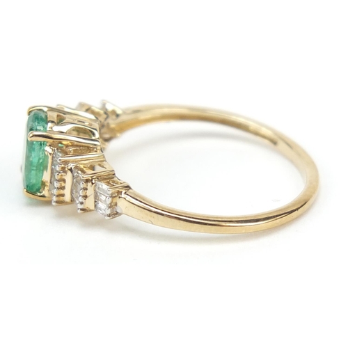 2357 - Unmarked gold emerald ring set with diamonds set stepped shoulders, size L, 1.5g