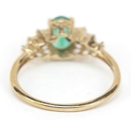 2357 - Unmarked gold emerald ring set with diamonds set stepped shoulders, size L, 1.5g