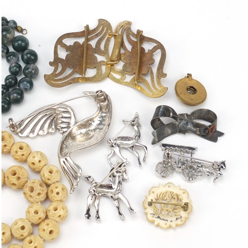 2932 - Vintage and later jewellery including an enamelled two piece buckle, marcasite brooches and a carved... 