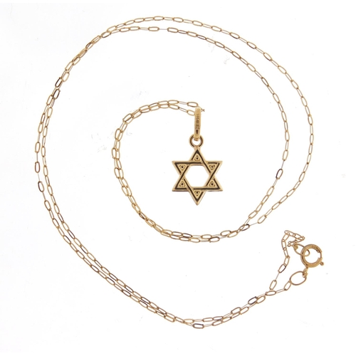 2401 - 9ct gold Star of David pendant on a 9ct gold necklace, the pendant 1.6cm high, total 0.5g