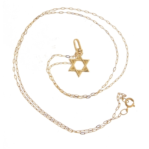 2401 - 9ct gold Star of David pendant on a 9ct gold necklace, the pendant 1.6cm high, total 0.5g