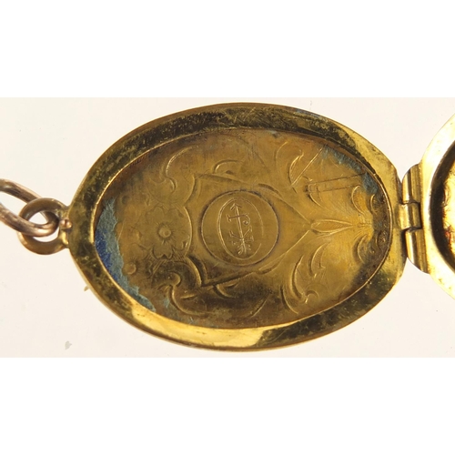 2385 - Victorian aesthetic silver coloured metal locket and a gold plated example, the largest 5.5cm high, ... 