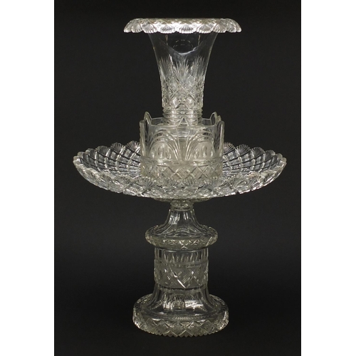 101 - Good large 19th century cut glass table centrepiece, possibly Irish, of four sections with trumpet v... 