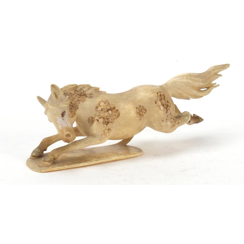 517 - Japanese carved ivory okimono of a horse, character marks to the base, 13.5cm in length