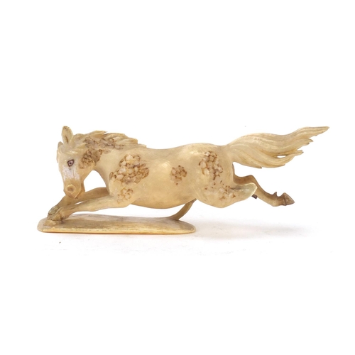 517 - Japanese carved ivory okimono of a horse, character marks to the base, 13.5cm in length