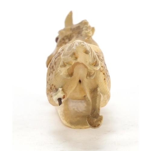 517 - Japanese carved ivory okimono of a horse, character marks to the base, 13.5cm in length