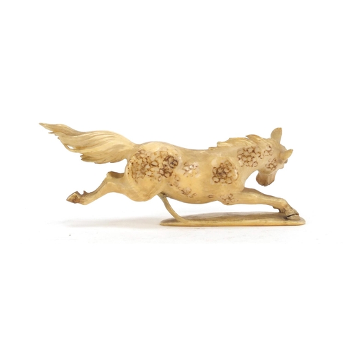 517 - Japanese carved ivory okimono of a horse, character marks to the base, 13.5cm in length