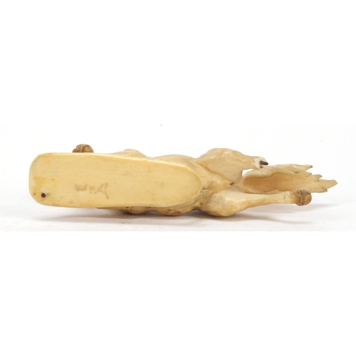 517 - Japanese carved ivory okimono of a horse, character marks to the base, 13.5cm in length