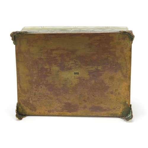 471 - Chinese green jade box and cover carved with flowers on bronzed base, 6cm H x 13cm W x 10cm D