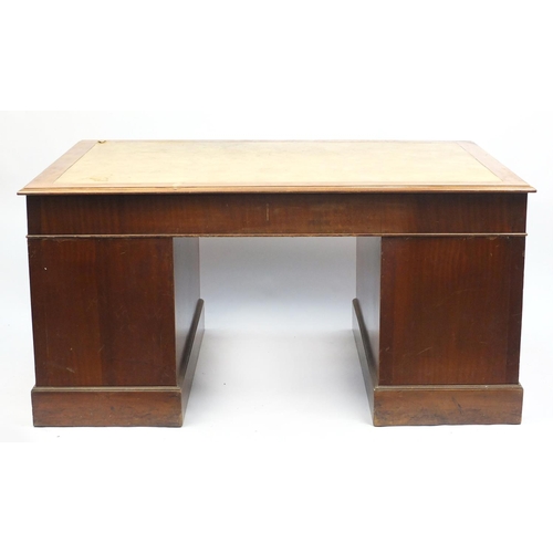 1499 - Mahogany twin pedestal desk fitted with a series of drawers, 74cm H x 152cm W x 107cm D