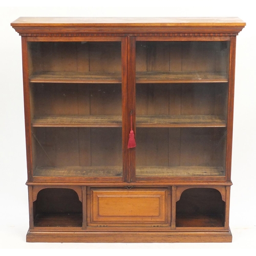 1478 - Walnut bookcase with a pair of glazed doors above a fall and open shelves, 132cm H x 129cm W x 30cm ... 