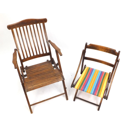 1590 - Two Victorian campaign type folding chairs, the largest 84cm high