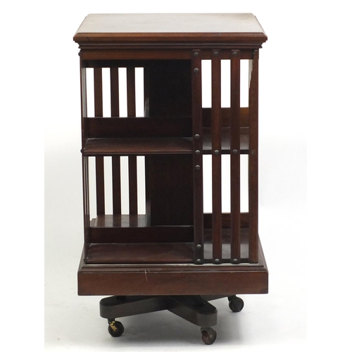 1477 - Mahogany revolving bookcase, 86cm H x 49cm W x 49cm D