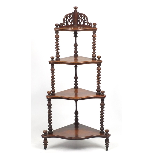 1474 - Victorian walnut four tier whatnot with serpentine front, 137cm high