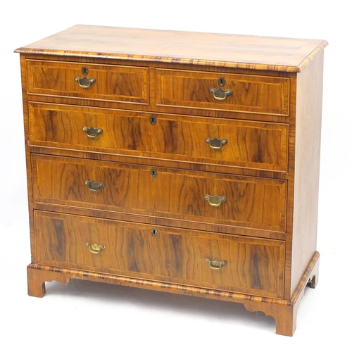 1454 - Antique walnut feather and cross banded five drawer chest fitted with two short above three long gra... 