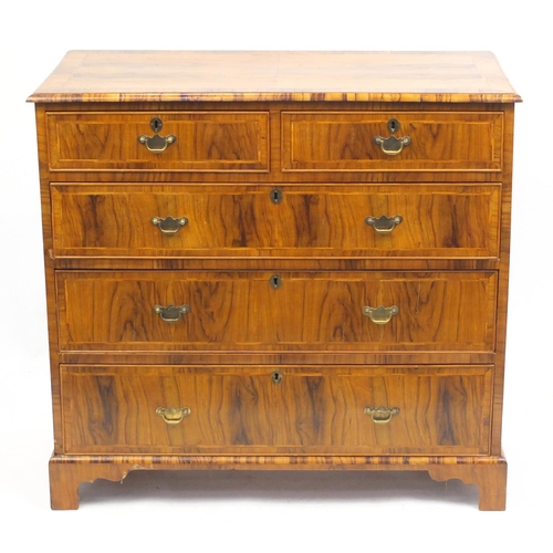 1454 - Antique walnut feather and cross banded five drawer chest fitted with two short above three long gra... 