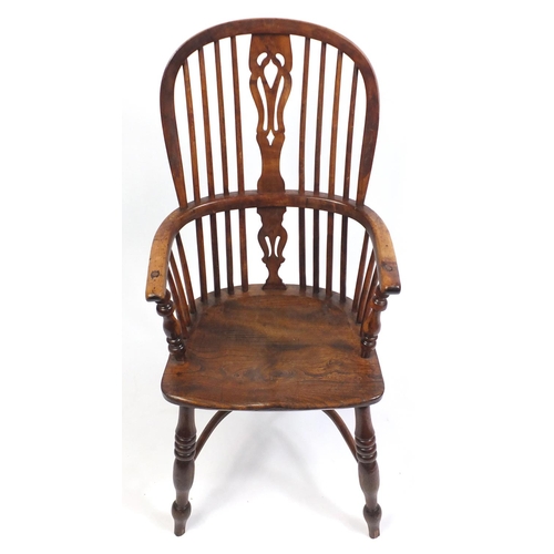 1555 - Victorian elm and yew Windsor chair with crinoline stretcher, 106cm high