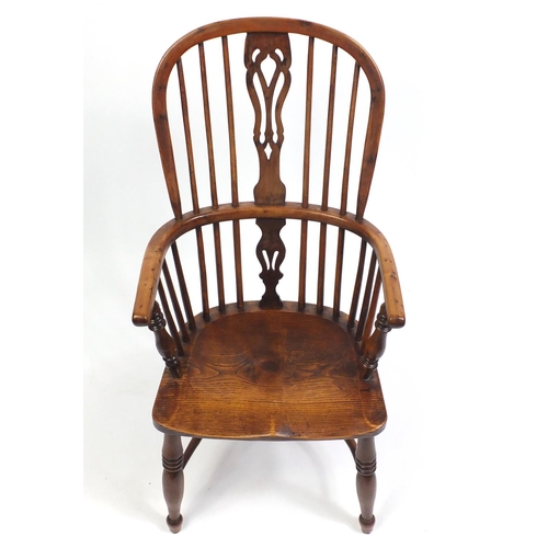 1498 - Victorian elm and yew Windsor chair with crinoline stretcher, 106cm high