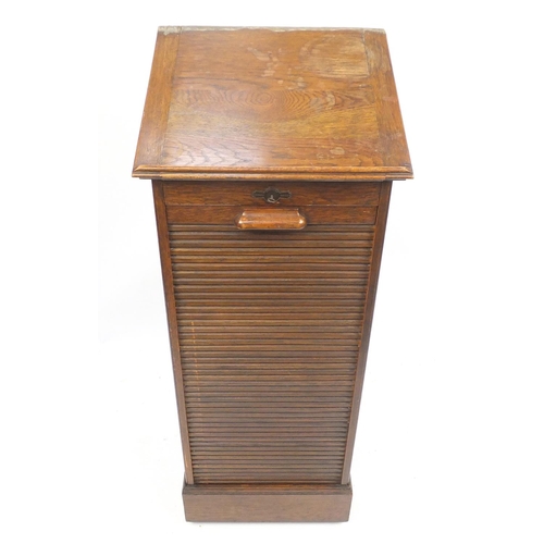 1455 - 1920's oak filing cabinet with tambour front and easel top, 119.5cm H x 49.5cm W x 43.5cm D