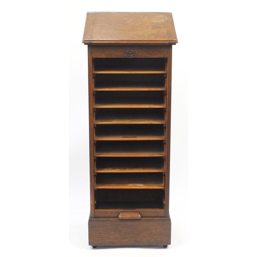 1455 - 1920's oak filing cabinet with tambour front and easel top, 119.5cm H x 49.5cm W x 43.5cm D