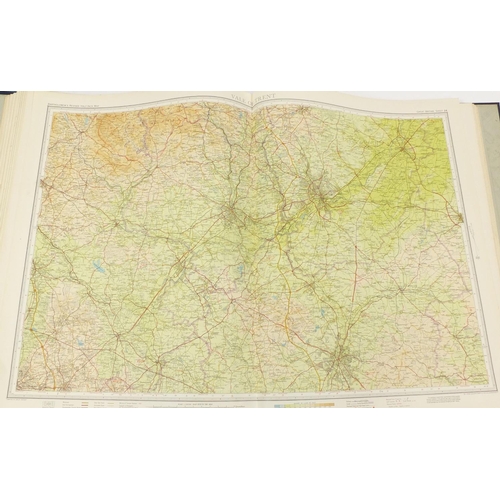 1267 - Bartholomews revised half inch contoured maps with case, for library reference