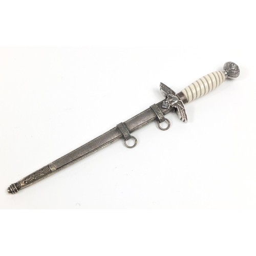 2129 - German military interest Luftwaffe 2nd pattern dagger with scabbard watered blade, 43cm in length