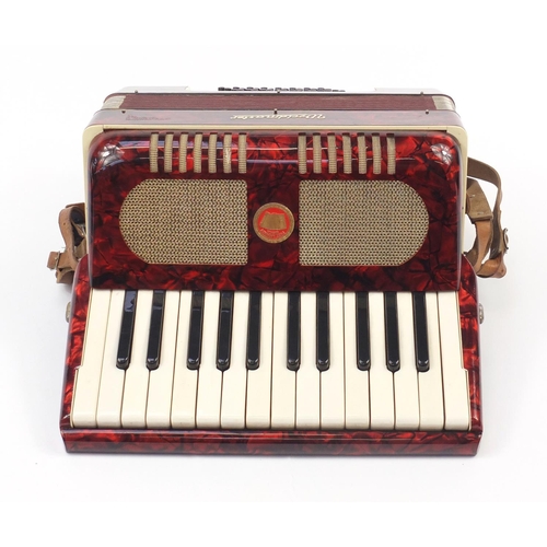 540 - Worldmaster red marbleised accordion with case