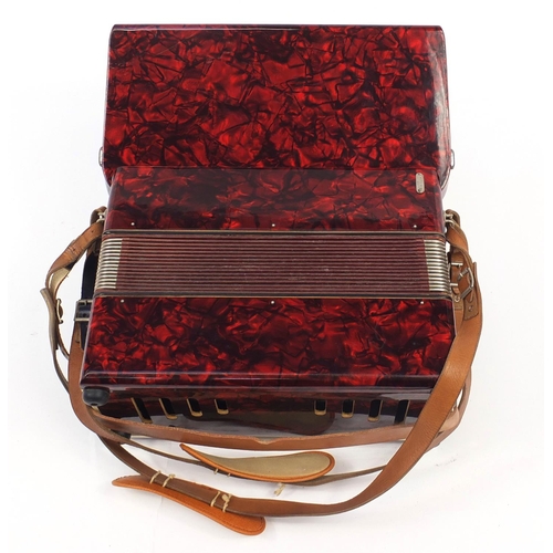 540 - Worldmaster red marbleised accordion with case