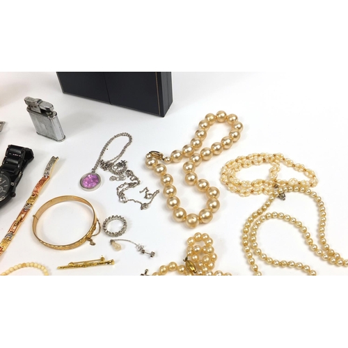 3733 - Costume jewellery including a simulated pearl necklace with silver gilt clasp, ivory necklace, gold ... 