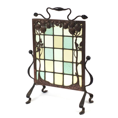 4 - Arts & Crafts wrought iron and copper fruit design firescreen with leaded clear and coloured glass p... 