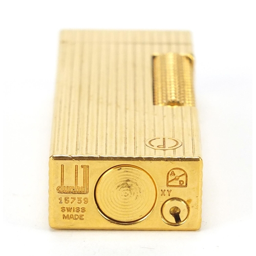 871 - Dunhill gold plated pocket lighter with dust case and fitted box, 6.5cm high