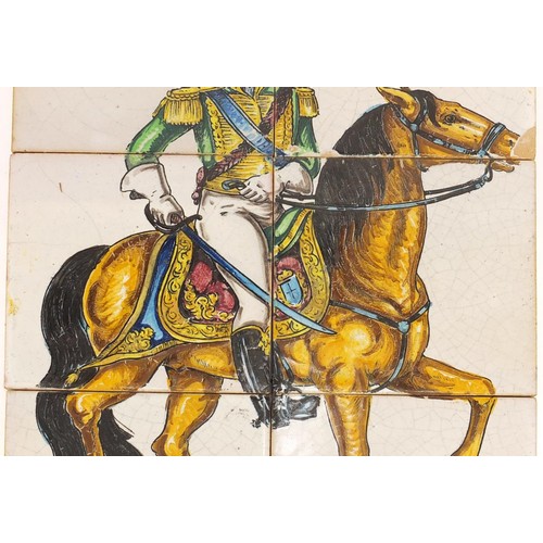 447 - 19th century Maiolica six tile panel hand painted with a soldier on horseback, overall 42cm x 28cm, ... 