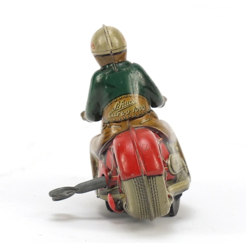 1761 - Schuco tin plate clockwork Curvo-1000 trick motorcycle