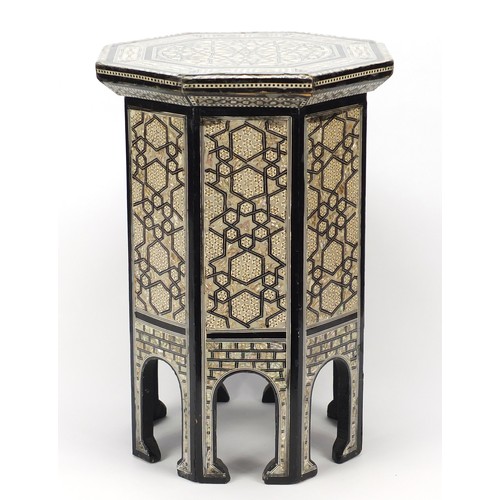 1514 - Syrian ebonised octagonal occasional table with mother of pearl geometric foliate inlay, 50cm high x... 