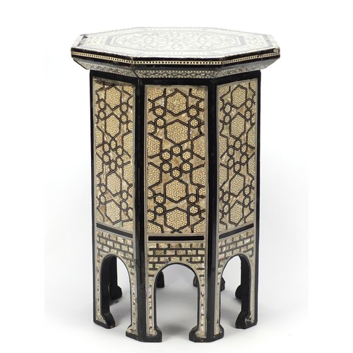 1514 - Syrian ebonised octagonal occasional table with mother of pearl geometric foliate inlay, 50cm high x... 