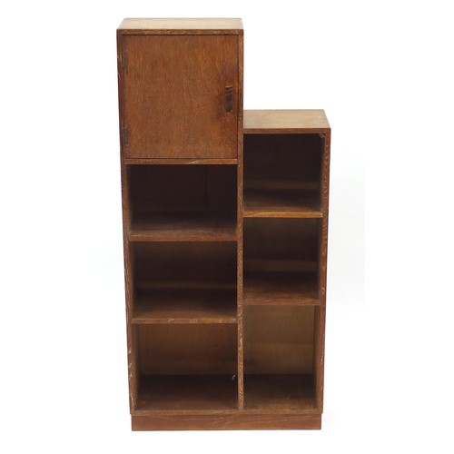 1451 - Heal's, Art Deco limed oak open bookcase with cupboard, inset Heal's plaque to the reverse, 109cm H ... 