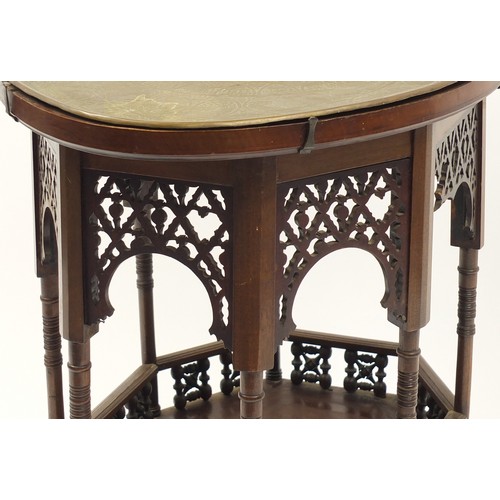 1513 - Liberty & Co, Moorish mahogany tea table with undertier and ornate brass lift out tray decorated wit... 