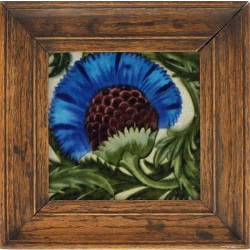 214 - William De Morgan, Arts & Crafts pottery BBB tile hand painted with a stylised thistle and foliage, ... 