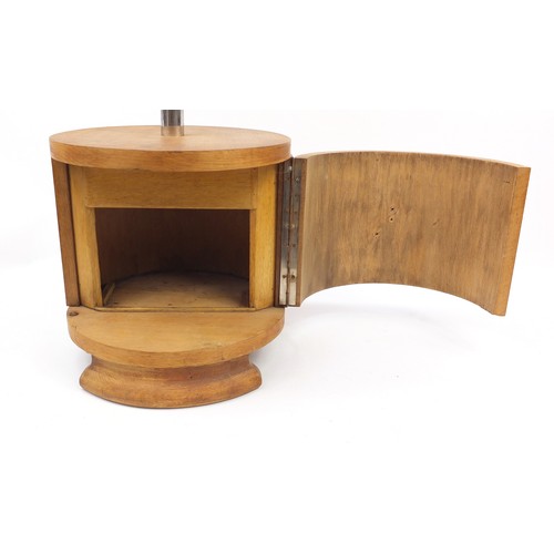 1503 - Art Deco circular oak pedestal occasional table with glass top and cupboard base, 68cm high x 40cm i... 