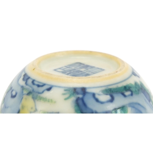 220 - Chinese doucai porcelain tea cup, hand painted with a young boy and chicken, calligraphy to the reve... 