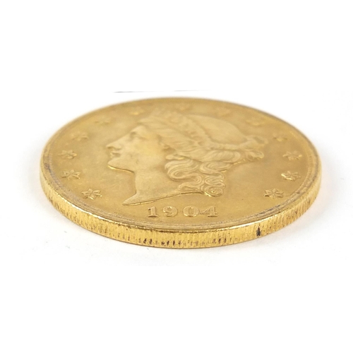 110 - United States of America 1904 gold twenty dollars, Liberty head to the reverse, 33.6g - this lot is ... 