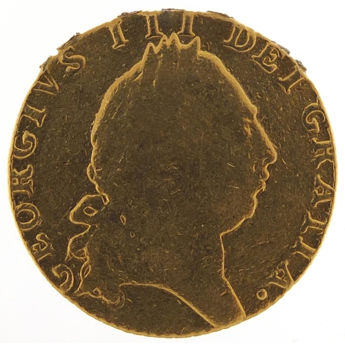 98 - George III gold spade guinea (obscured date) - this lot is sold without buyer’s premium, the hammer ... 