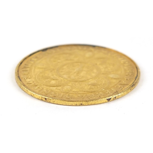 39 - 24ct gold commemorative gold coin with head of Nefertiti, 8.0g - this lot is sold without buyer’s pr... 