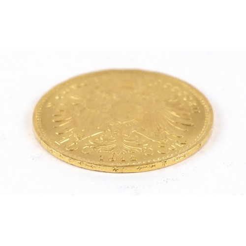 73 - Austrian 1912 gold ten corona, 3.4g - this lot is sold without buyer’s premium, the hammer price is ... 