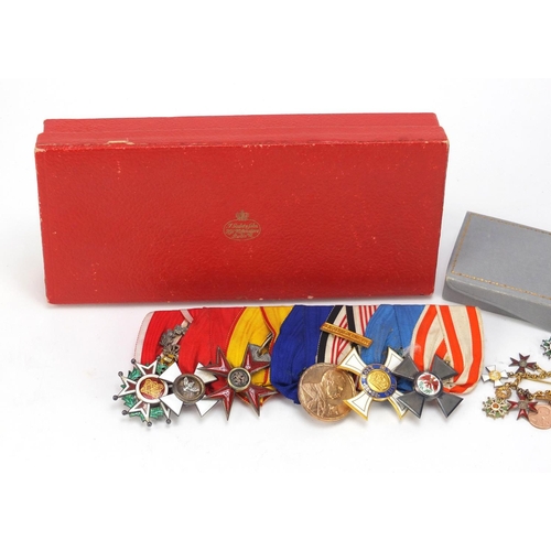 1356 - Foreign military interest medals and dress medals including Order of the Griffon with fitted case
