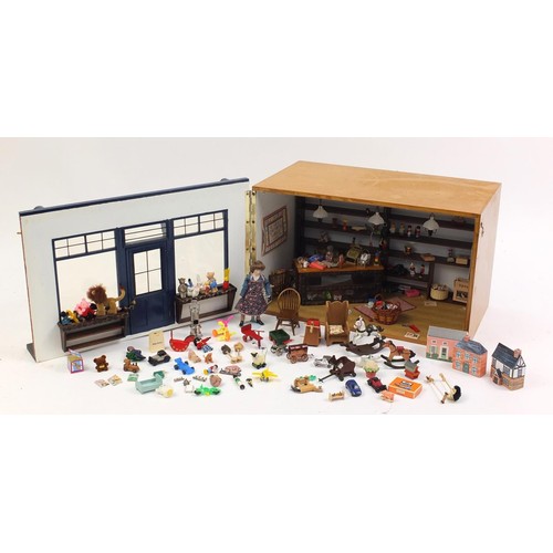 3033 - Hand built wooden model doll's house toy shop with contents, 30cm H x 47cm W x 32cm D