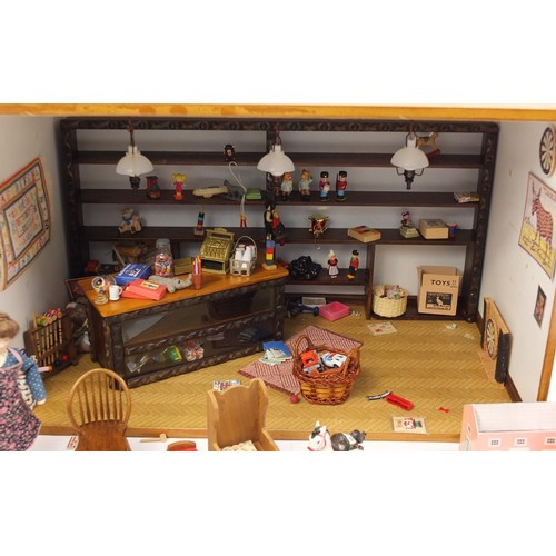 3033 - Hand built wooden model doll's house toy shop with contents, 30cm H x 47cm W x 32cm D