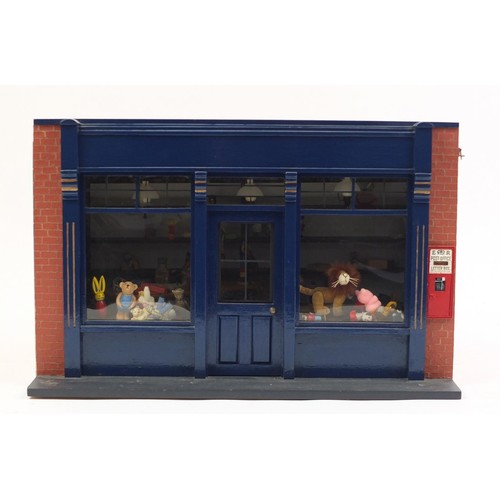 3033 - Hand built wooden model doll's house toy shop with contents, 30cm H x 47cm W x 32cm D