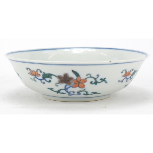 223 - Chinese doucai porcelain shallow bowl hand painted with flowers, six figure character marks to the b... 